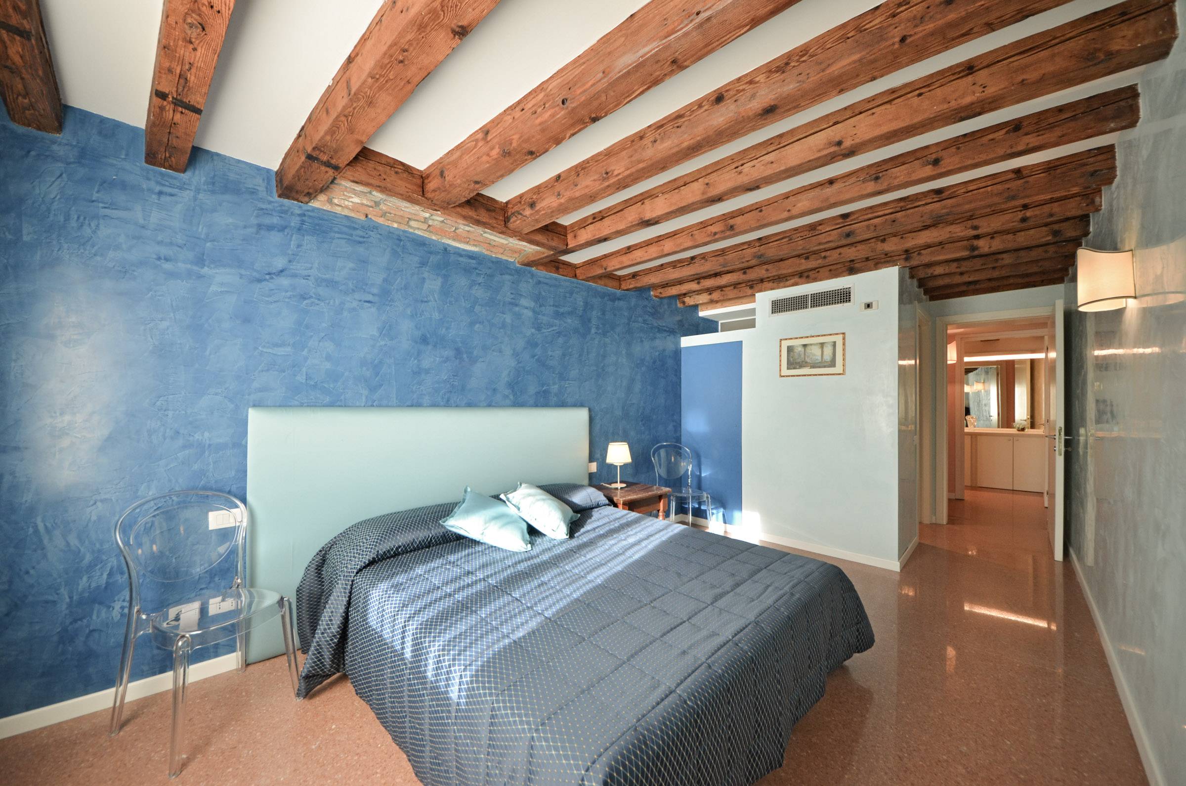 sunny master bedroom with en-suite bathroom